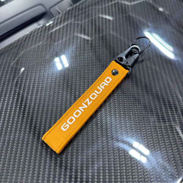 Orange Goonzquad Key Tag